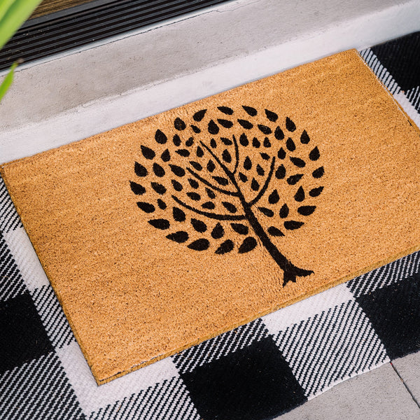Tree of life silhouette doormat in natural coir, showing [specific detail: full design / texture close-up / placement at door