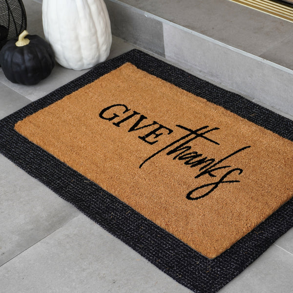 Give Thanks doormat in natural coir with graceful script, shown